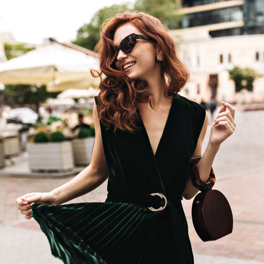 Woman in a stylish outfit walking on a city street