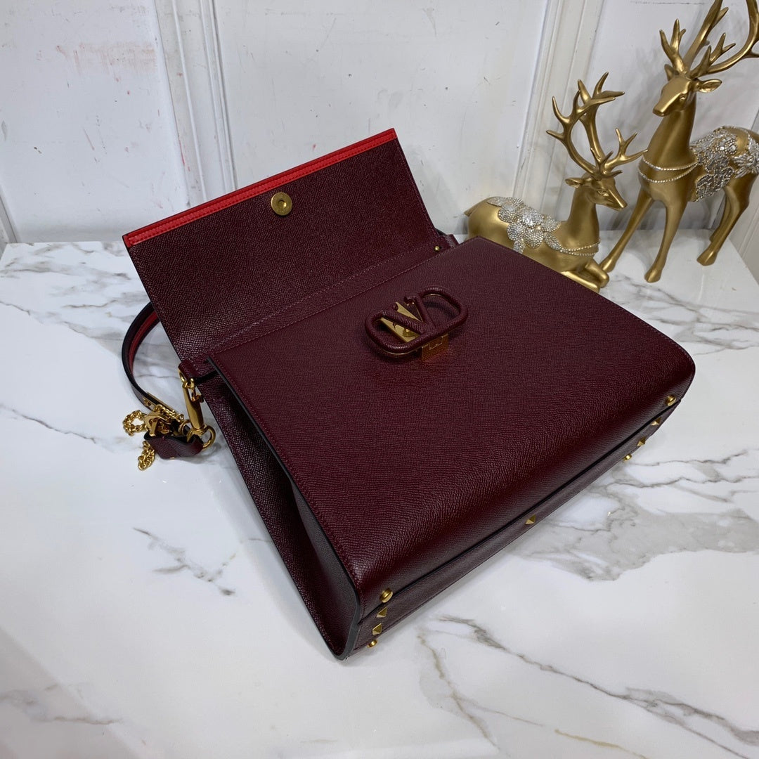 Valentino Garavani Small VSLING Grainy Calfskin Handbag