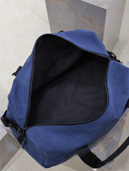 Saint Laurent Nuxx Logo-Embroidered Corduroy Duffle Bag